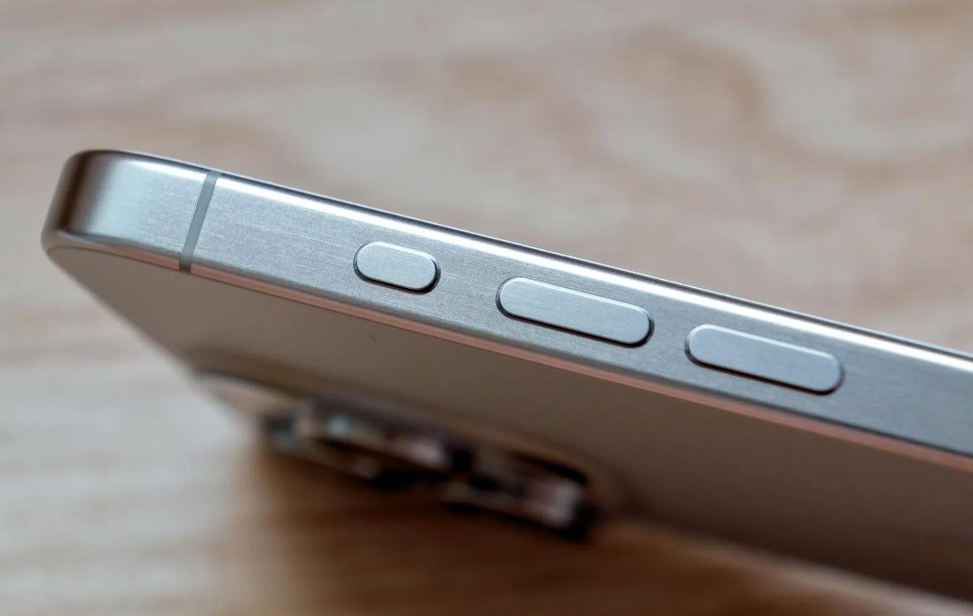 The titanium has a nice brushed finish, and, oh look, it's the new Action Button.