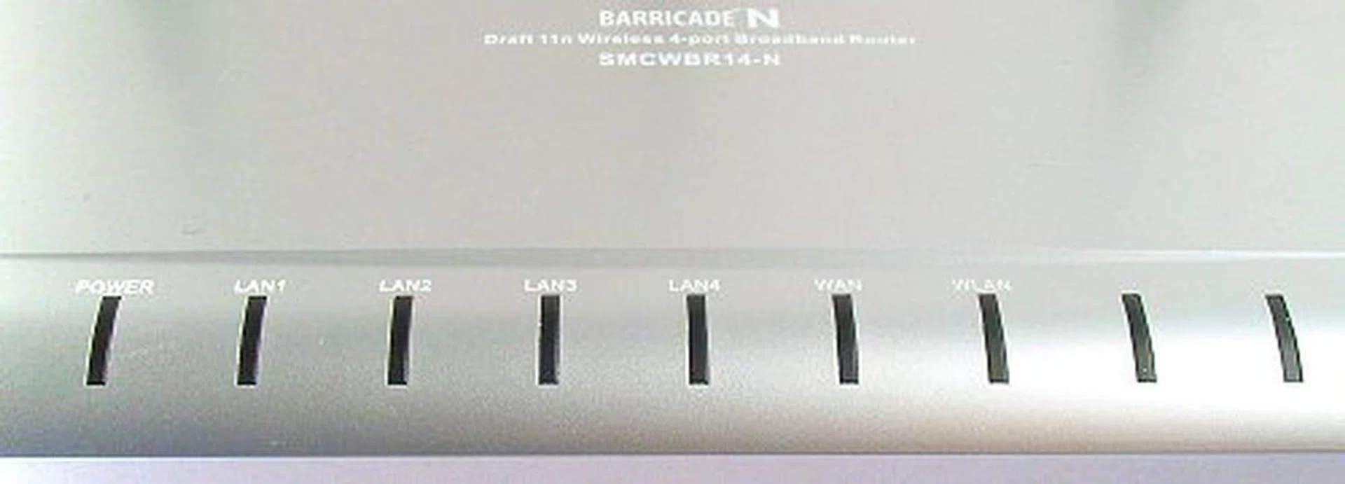 Standard set of power, LAN, WAN, WLAN and activity status LED indicators align the front face of the router.