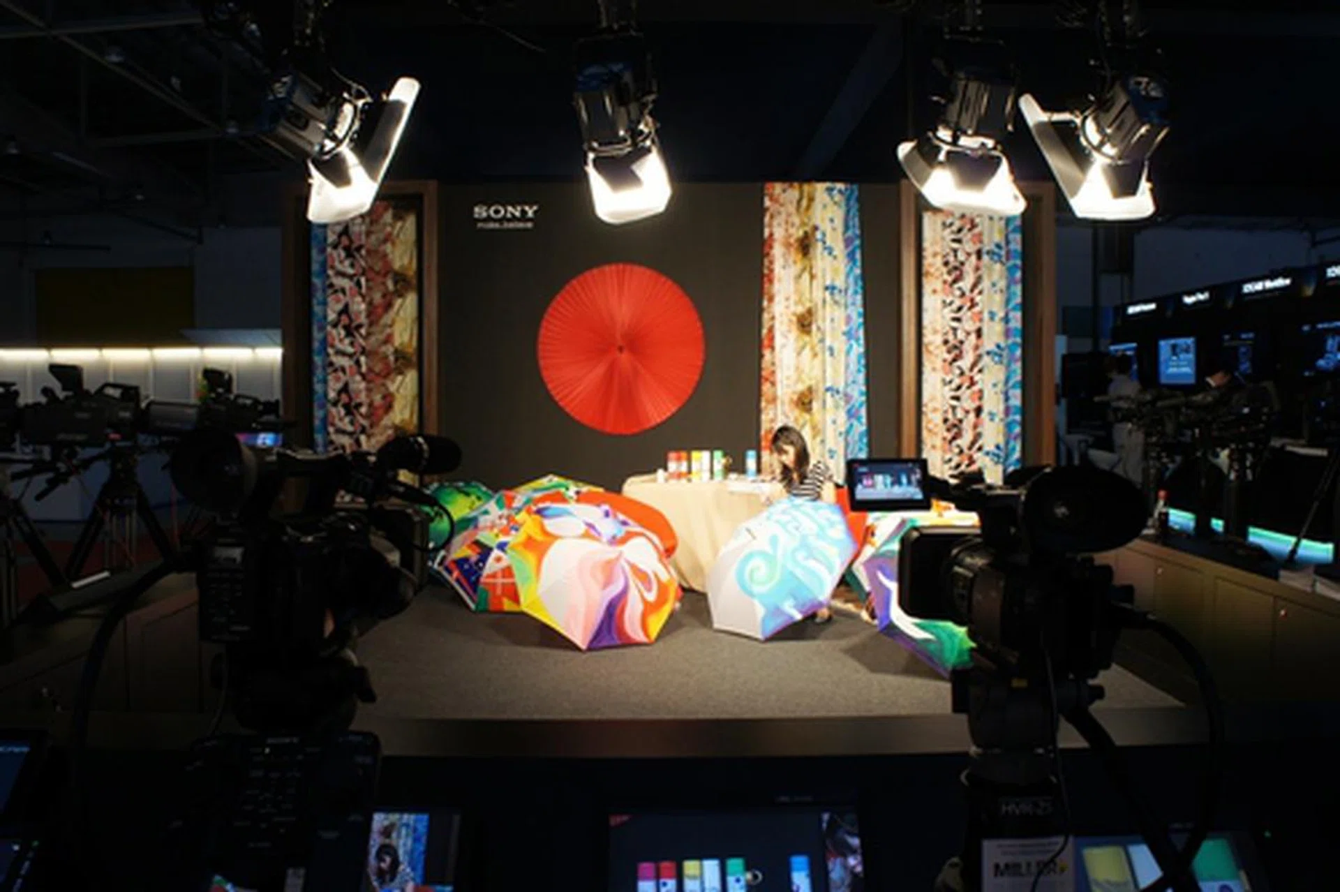 Sony had a rather artistic umbrella painting session going on at their showcase. While there weren't any live action stunts taking place, the emphasis here was the faithful color reproduction aspect of their many professional video cameras mounted around this demo.