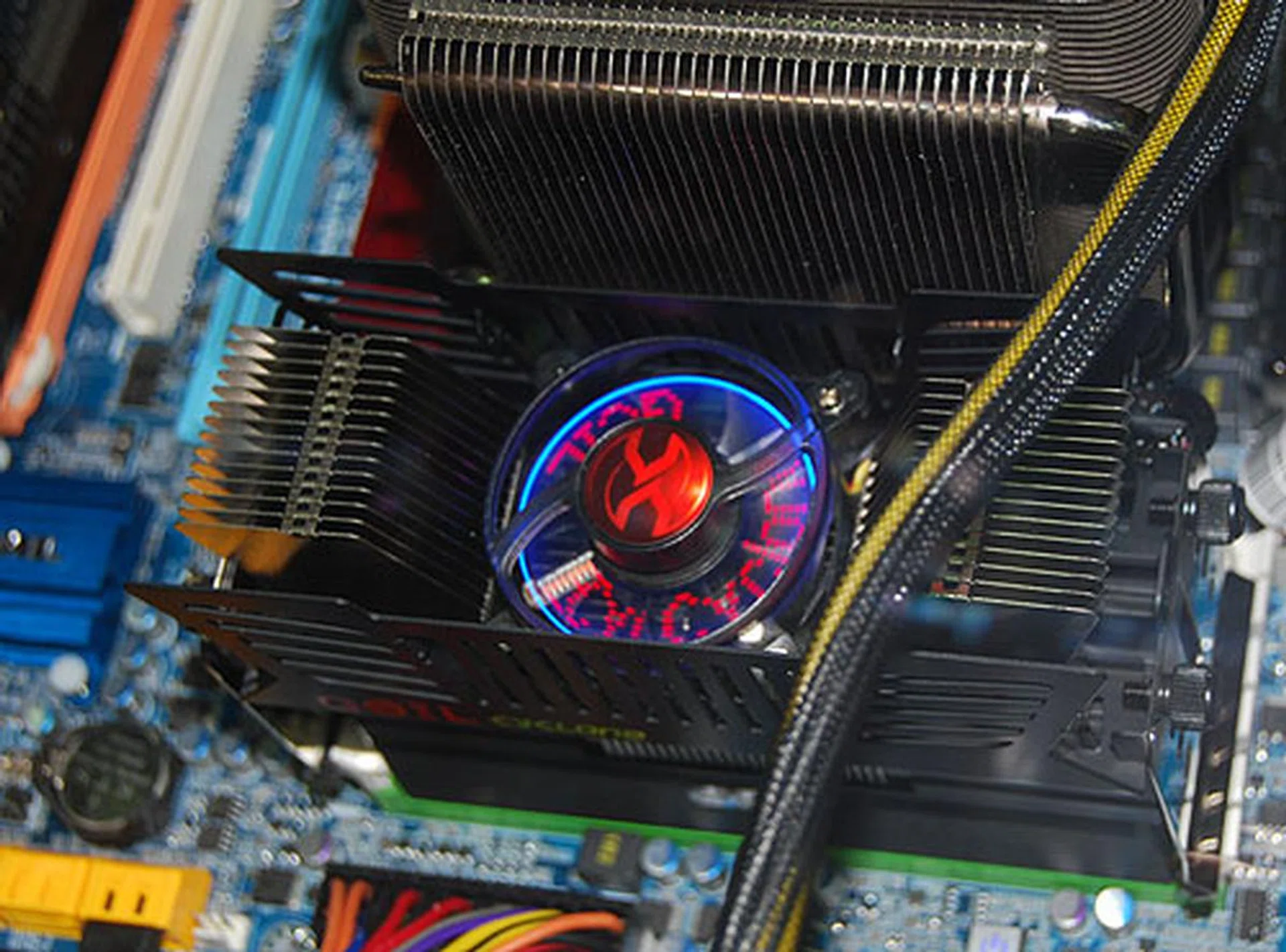  The memory under the Geil Cyclone RAM cooler is its Ultra series, which is DDR3-1800 memory rated at a low 8-8-8-28.  