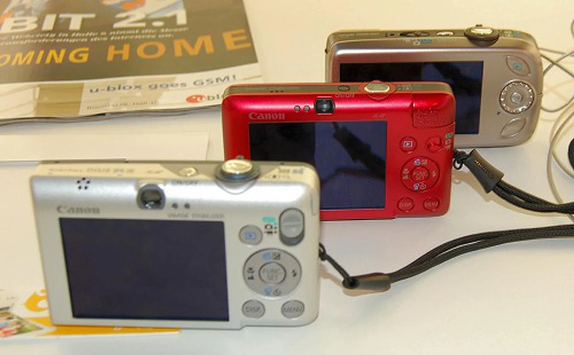  The IXUS 95 IS (in grey), is the successor to the Canon Digital IXUS 80 IS, This new device comes with a 10-megapixel sensor and lets you view your images on a 2.5-inch PureColor LCD II display. It also comes with the new Canon DIGIC 4 processor that should significantly improve image-capturing speeds.  
