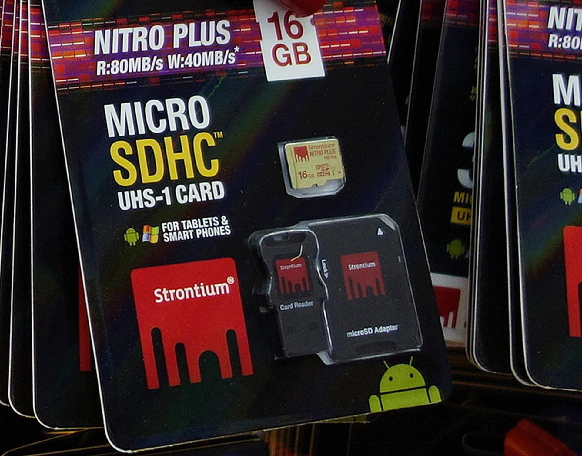The Strontium Nitro Plus microSDXC card comes with a USB card reader and a SD card adapter. It allows the card to be used with a variety of devices right out of the box! The 16GB retails at $14, 32GB ($27.60) and the 64GB ($55).