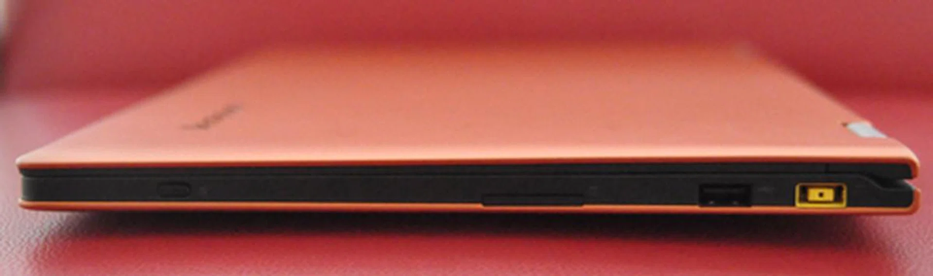 On the right side is an orientation lock button, card reader, USB 3.0 and Lenovo's proprietary power port. 