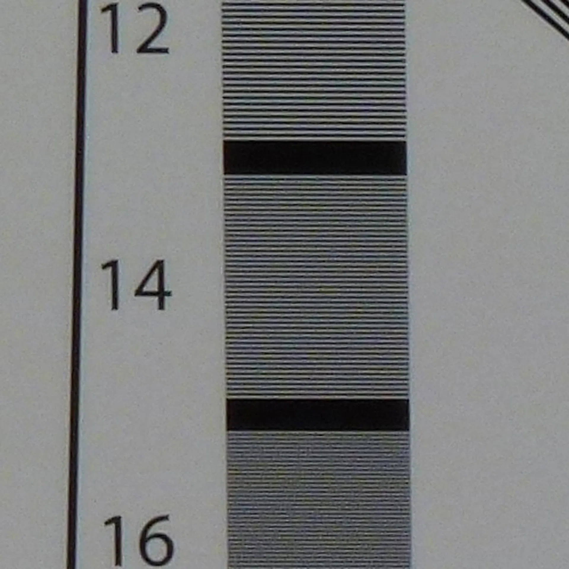 100% crop of our resolution test. Shot at 5x optical zoom (142mm).
