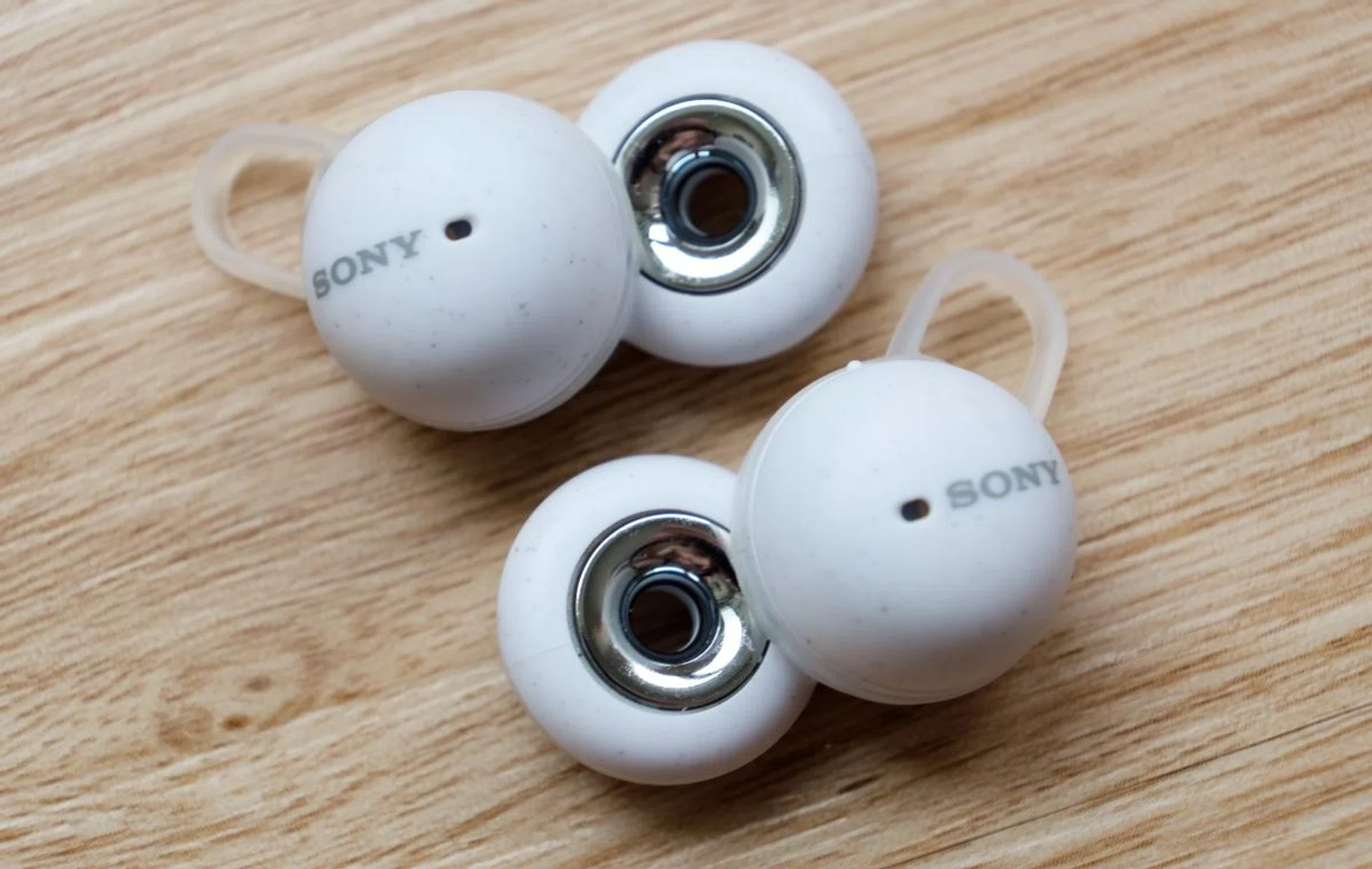 The LinkBuds have a hole to let you hear your surroundings clearly.