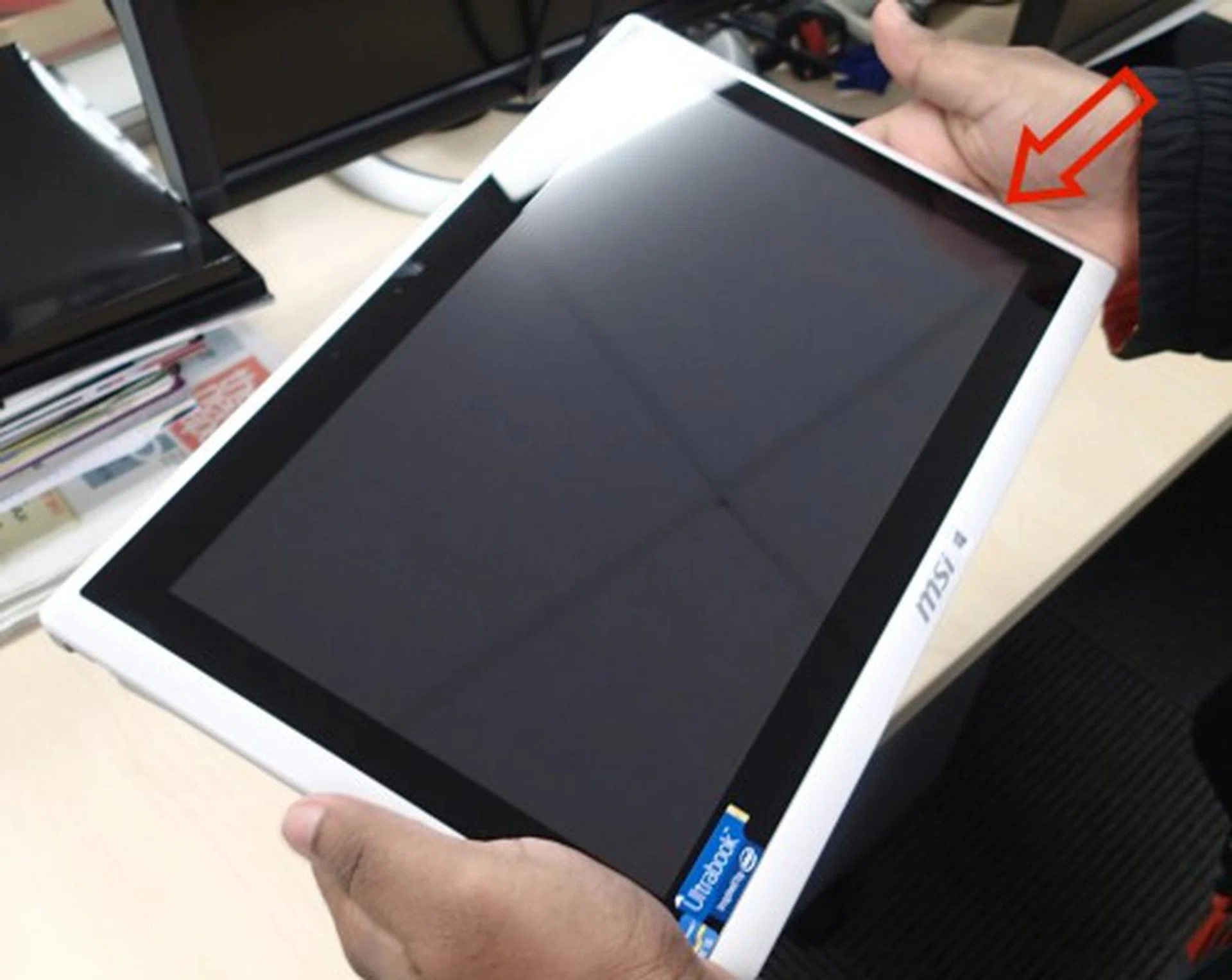 As indicated, the power button of the device is located on the side just where you would usually place your hands to cradle the device. The only time you won't be handling such is when you're using it on the table.