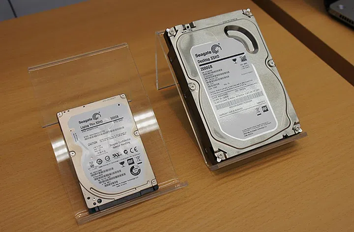 Traditional mechanical hard drives are not going anywhere soon. Drives such as Seagate's SSHD combines the traditional mechanical hard drive with a small amount of flash memory to boost performance.
