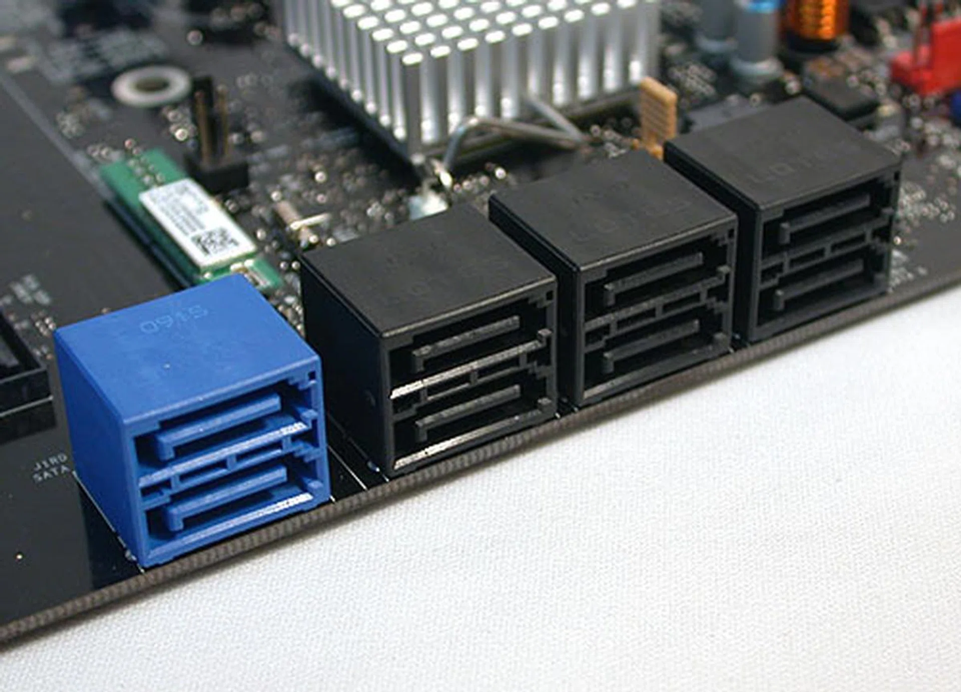 The P55 PCH only provides a maximum of six SATA 3.0Gbps ports (unfortunately no next-gen SATA support yet). The remaining two come from a secondary SATA controller.