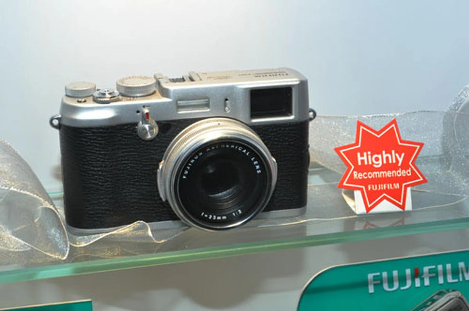 The long-awaited Fujifilm X100 is finally here. It's selling for $1699, with free gifts including a 16GB SD card, a tall tripod, a premium case and battery. The rangefinder-like digital camera with a hybrid viewfinder, 35mm (equivalent) F2 lens and 12MP APS-C sensor has limited sets available, so if you want one you better head down fast!