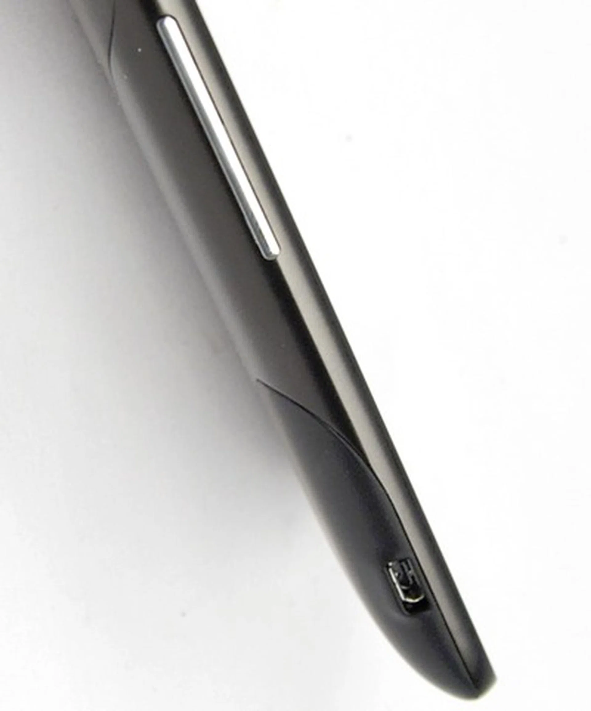 You'll find minimal physical buttons, such as the volume control situated above the microUSB port...