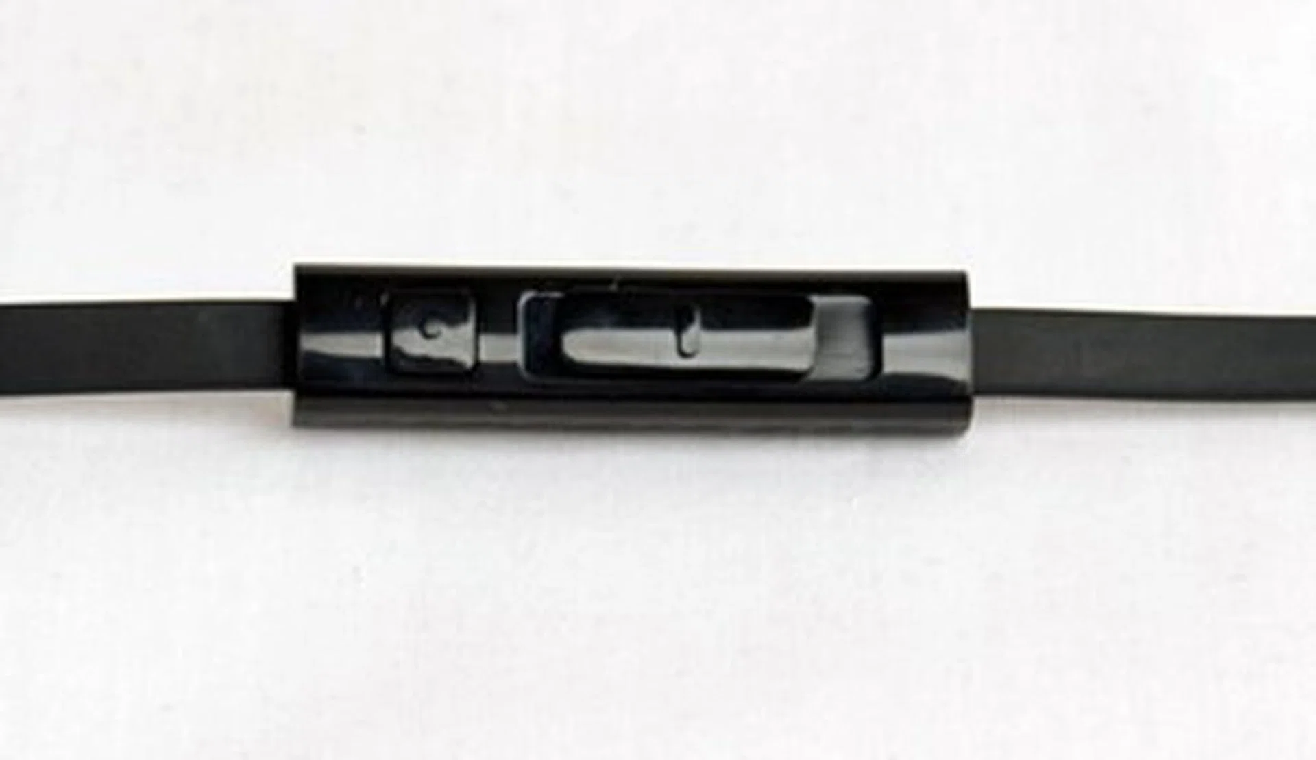 A simplistic remote features just a volume slider and one button to accept calls.