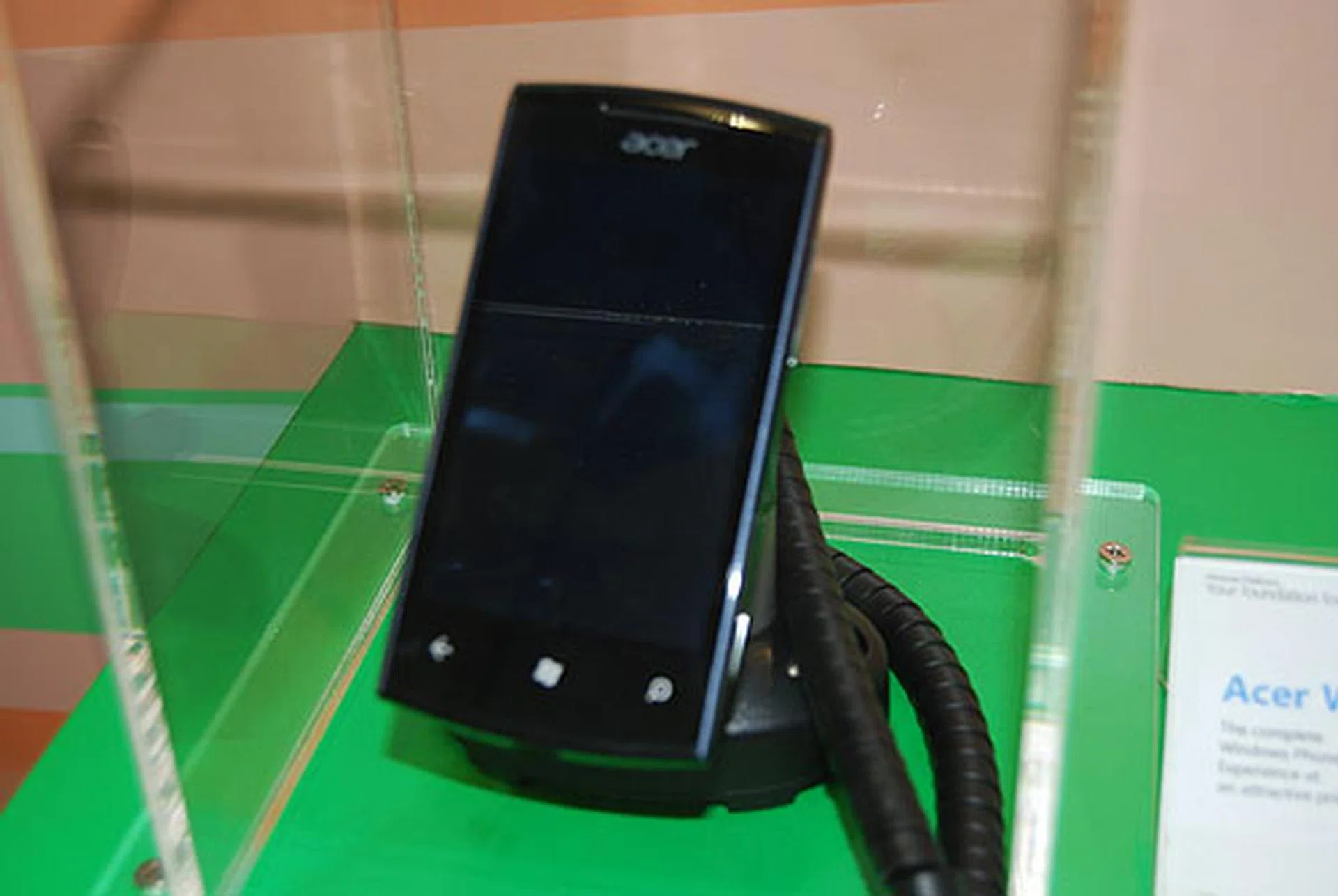 This is the Acer W4 Windows Phone 7 (Mango) smartphone we saw earlier at the Acer booth. It has a 1GHz Qualcomm processor and a 3.6-inch capacitive touch screen. Microsoft states that it will be available this November. 