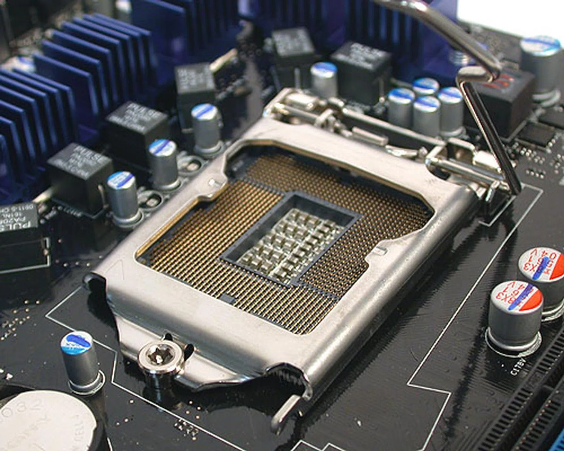 This is the new LGA1156 socket, which uses a slightly different locking mechanism from the LGA1366.