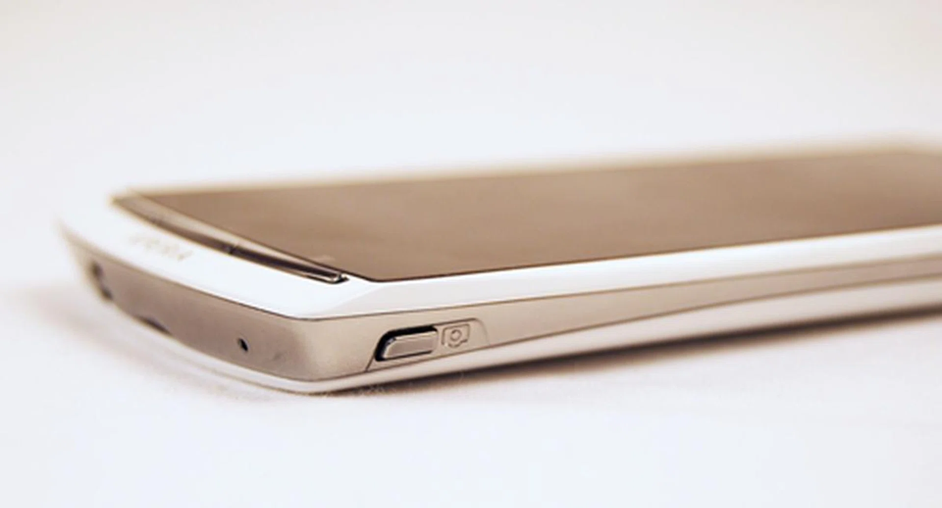 Buttons are still too tiny and flushed, making them difficult to press. Take for example, the shutter button.