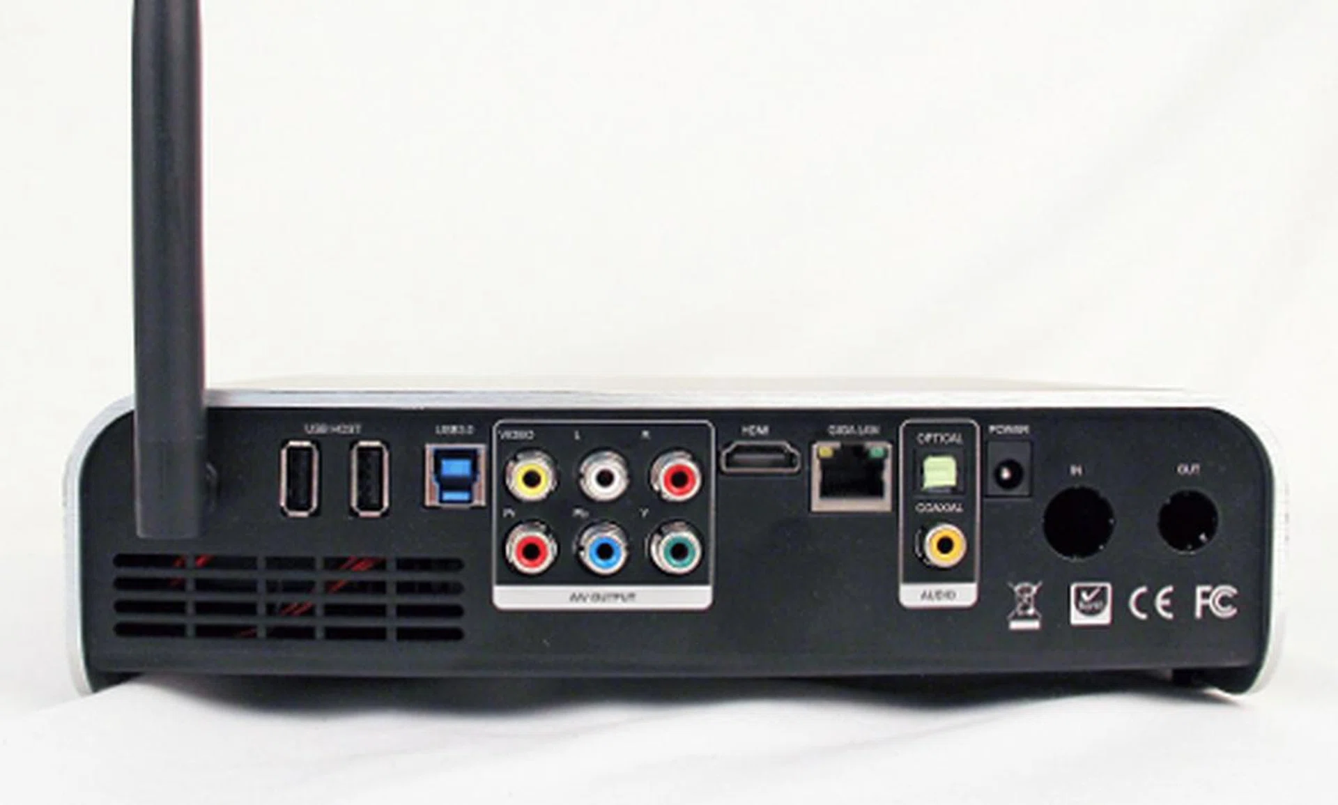 Due to the Xtreamer Prodigy Silver's larger footprint, there's a truckload of I/O ports on the rear. While there's an antenna (on the left in the image above) to help with wireless signal strength, we did not notice any significant boost in speed while using Wi-Fi to access stored content on another system.