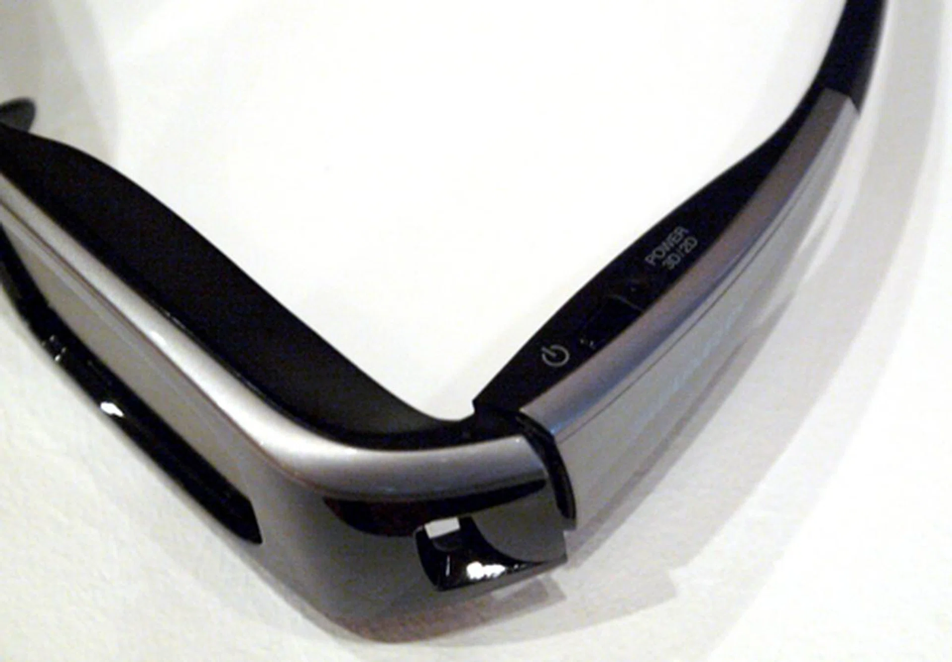 Sharp's 3D eyewear is a little bulky, but it harbors a nifty feature which does 3D to 2D conversion at the press of a button. You'll find it a littler farther down the power switch.