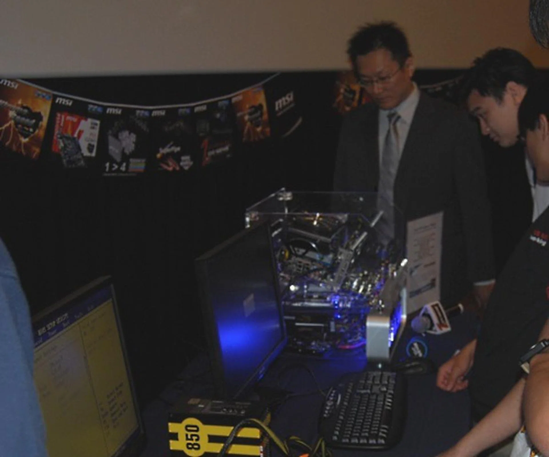 There was a bit of time after the presentation for some hands-on. Here was MSI's Project Manager Garrett Wu looking on as local enthusiasts try out the OC Genie feature.