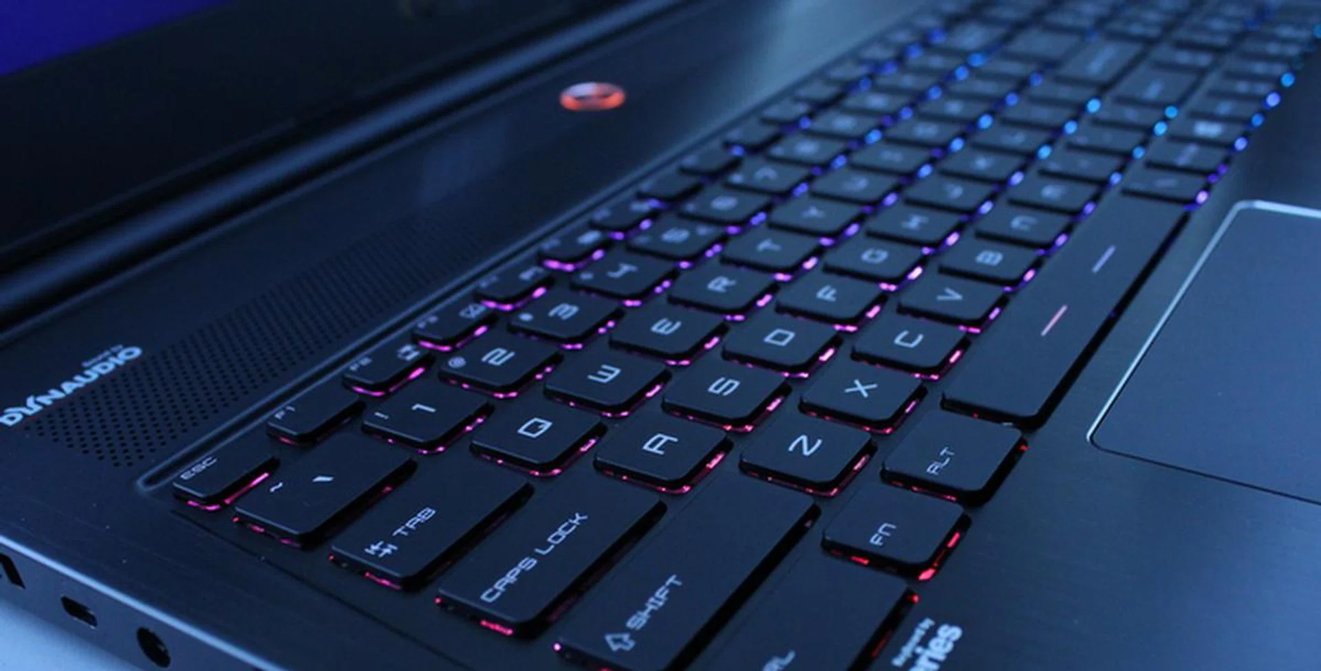 The keyboard has three backlight zones, and pictured above are the default colors that you'll see when you first boot up the notebook - red, purple, blue.