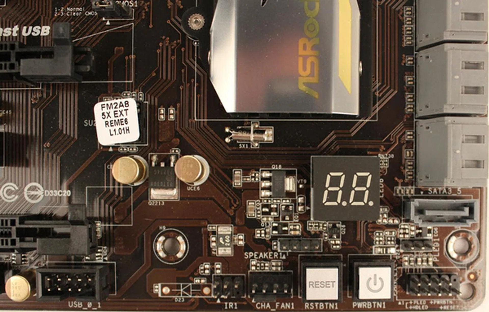 The two onboard buttons that reset and power up the system accordingly. Also note the debug LED segment - the only board in this comparison to have it.