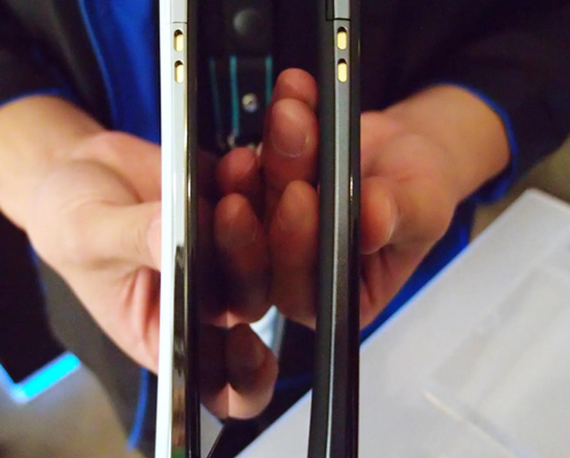 Borrowing a form factor quite similar to the arc/arc S series, the Xperia V comes with a slightly arched and thin (10.7mm) profile that makes it easy to hold while messaging or making calls. The white version comes with a shiny chrome finish on its sides while the black version spots a grey matte finish. Don't forget the phone also ranks high in water and dust resistance, which is quite a feat considering its slim design.