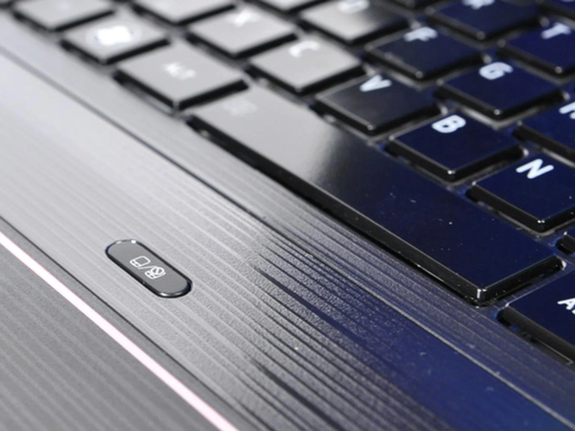 There is plenty of extra spacing between the trackpad and keyboard which we found to be quite wasteful.