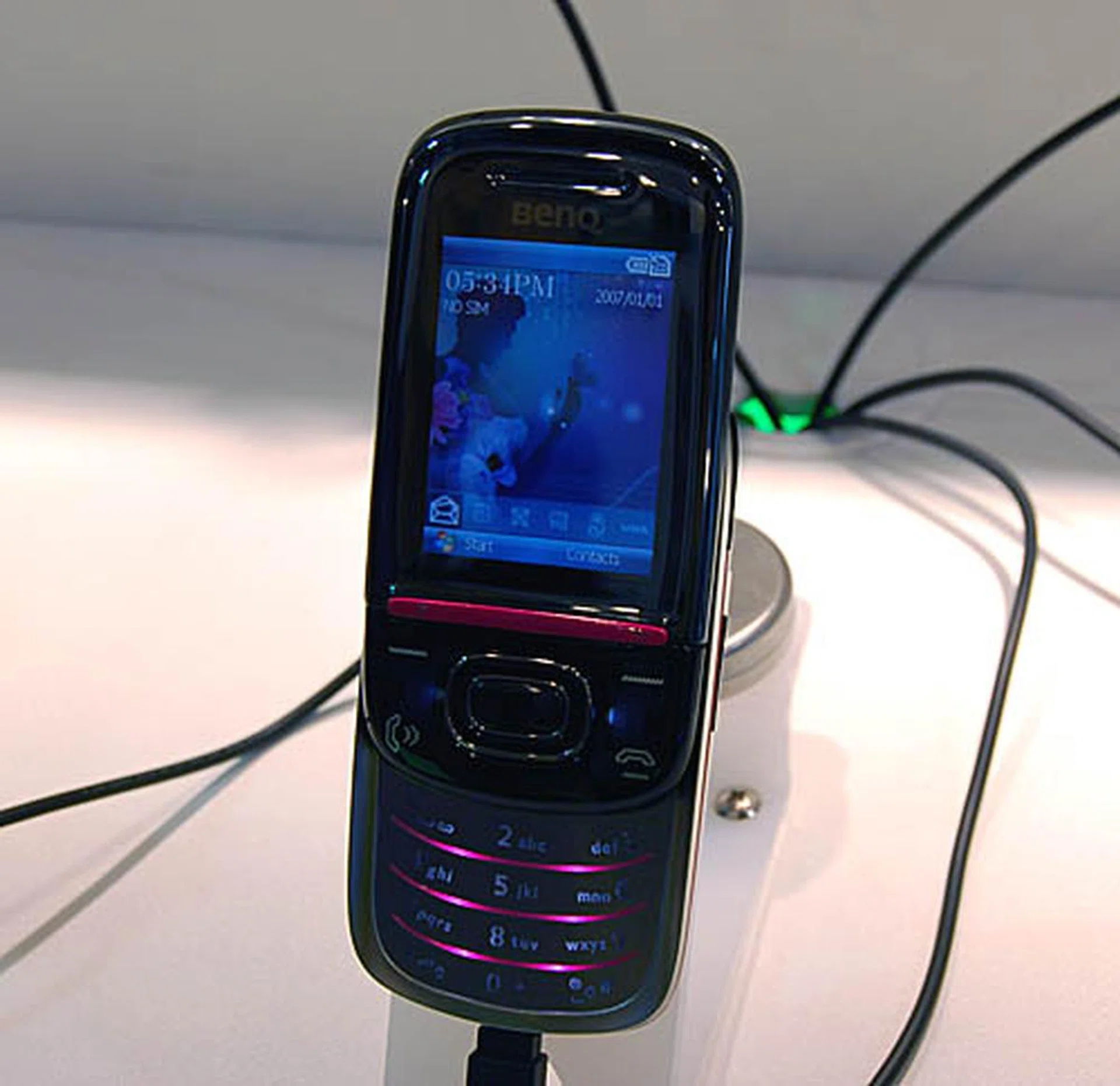  And we all thought that BenQ Mobile had gone bankrupt. It seems that BenQ has not given up its mobile phone ambitions, as we spotted this BenQ phone running on Windows Mobile 6.0 at the Microsoft booth.  