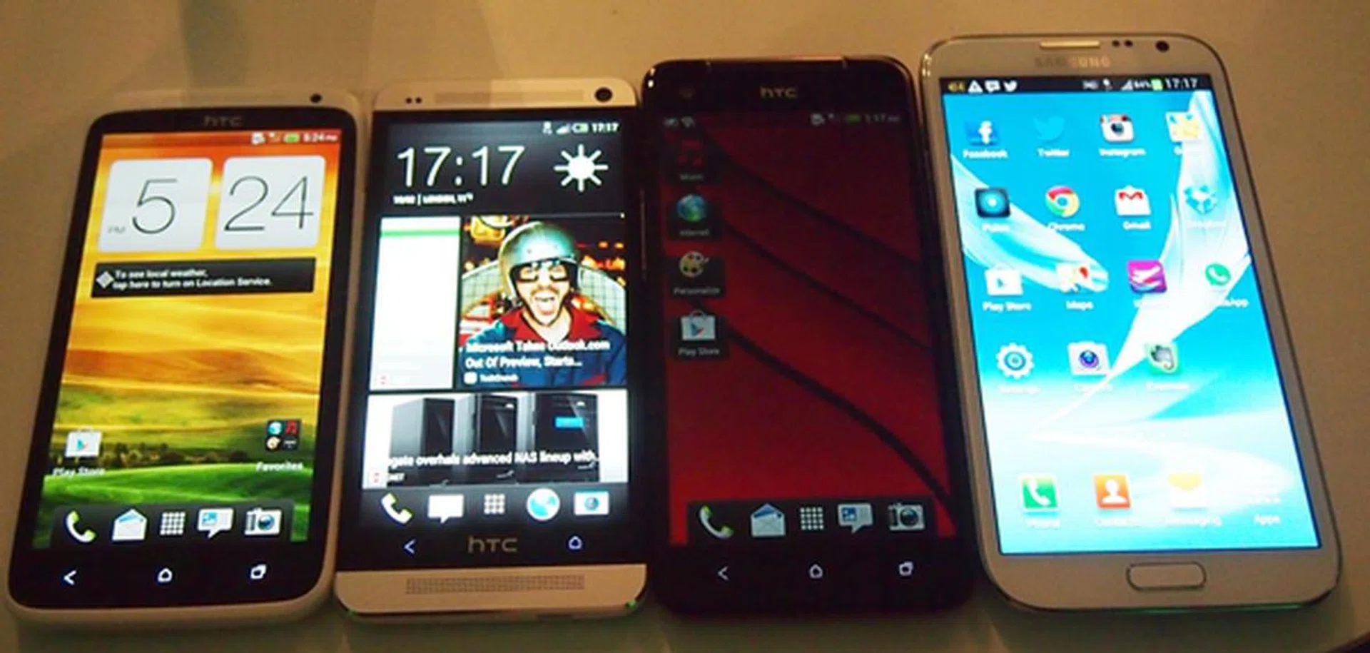 From left to right: the HTC One X, One, Butterfly and Samsung Galaxy Note II.