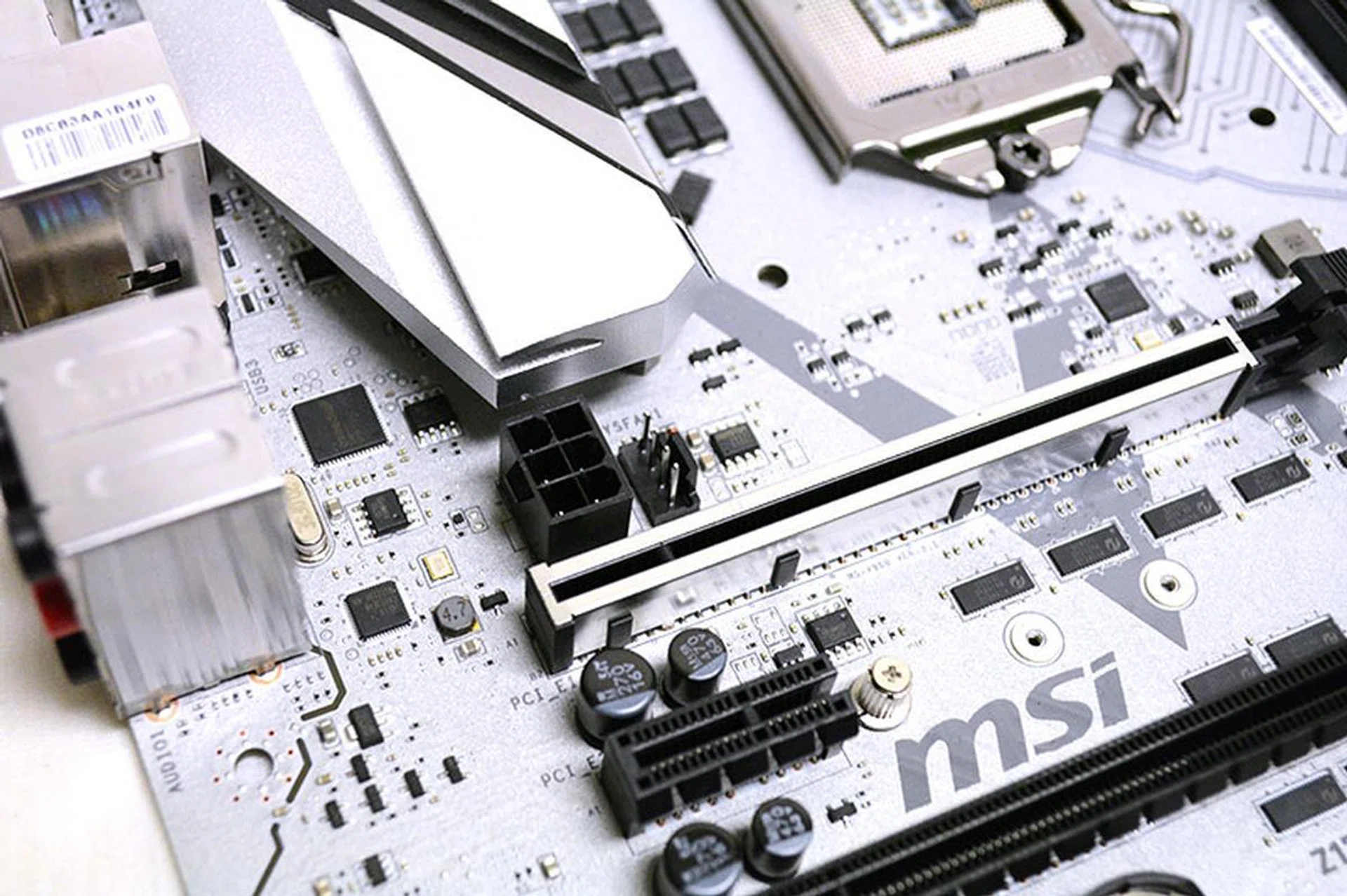 A look at the 6-pin header above the topmost PCIe 3.0 x16 slot. The header provides additional power to the PCIe 3.0 x16 slots.