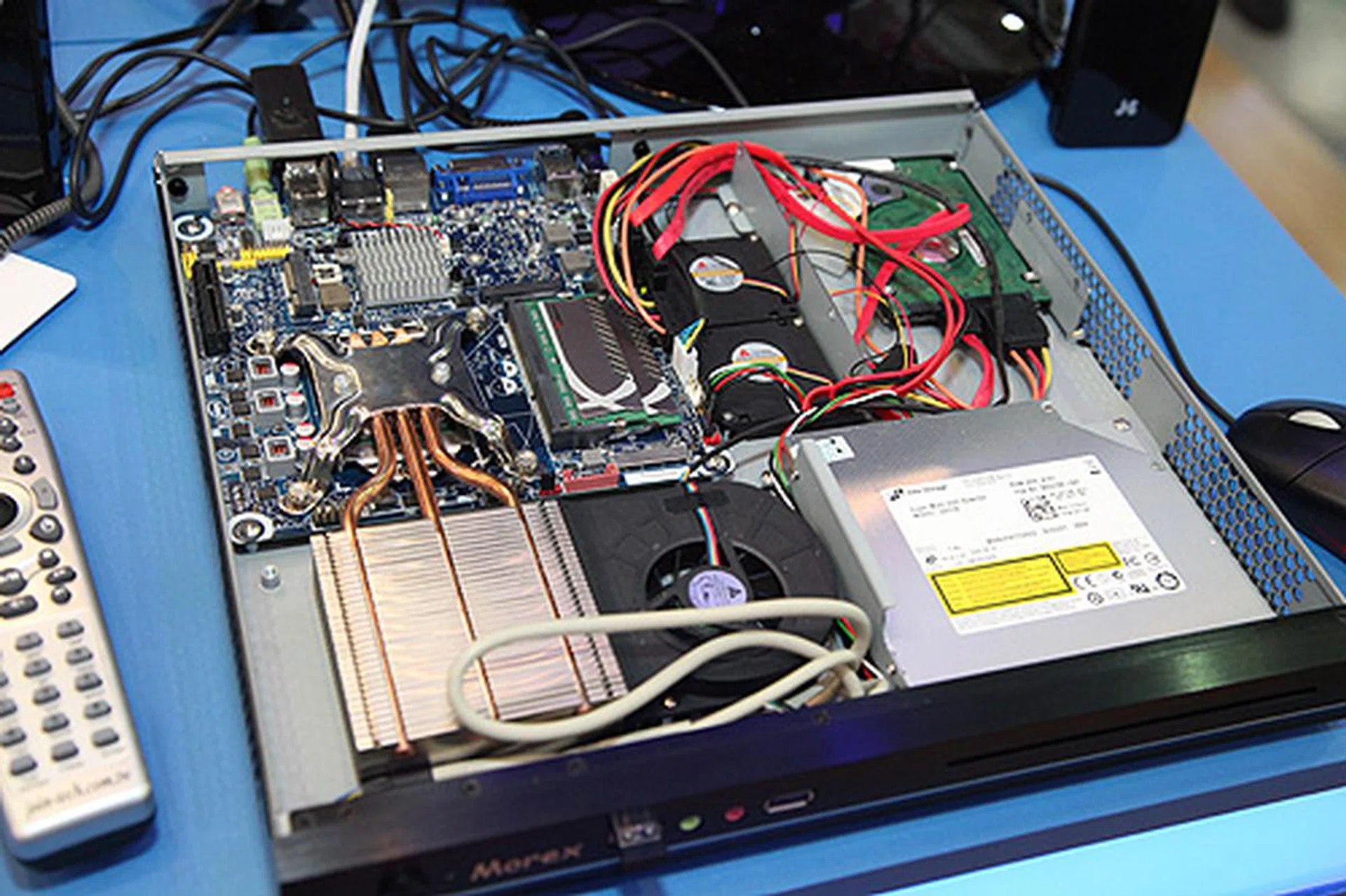 Intel's recently announced Thin Mini-ITX form factor boards are finding their way into new thin and light systems. Integration seems simple enough and it's enabling future slim desktops that you'll probably find in the retail channel or through individual system integrators.