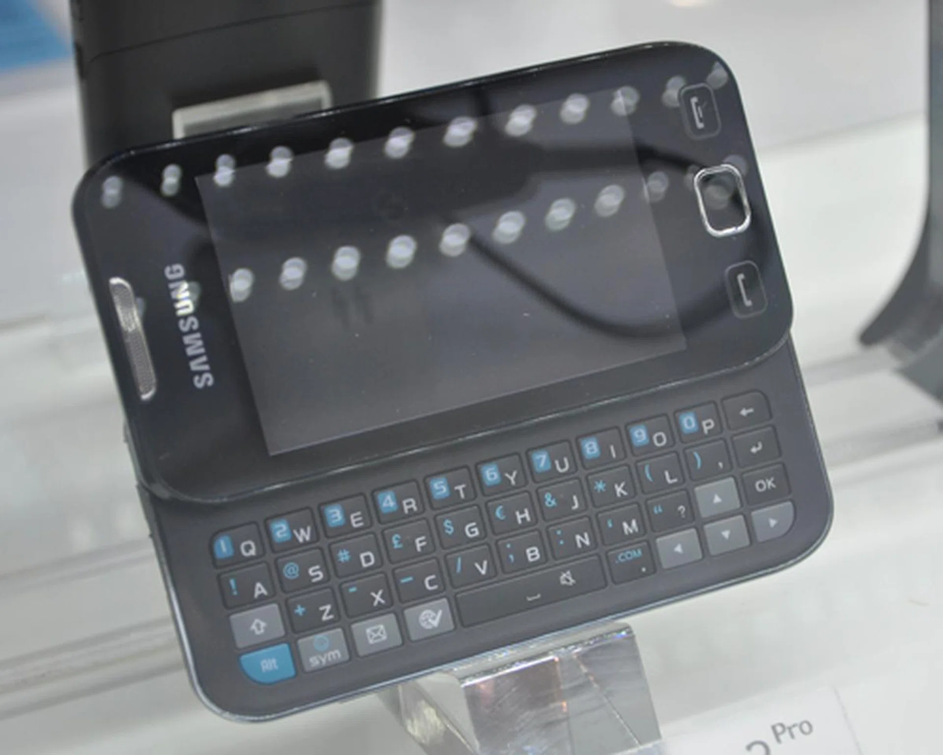 The Samsung Wave 2 Pro comes with a QWERTY keyboard hidden underneath the display.