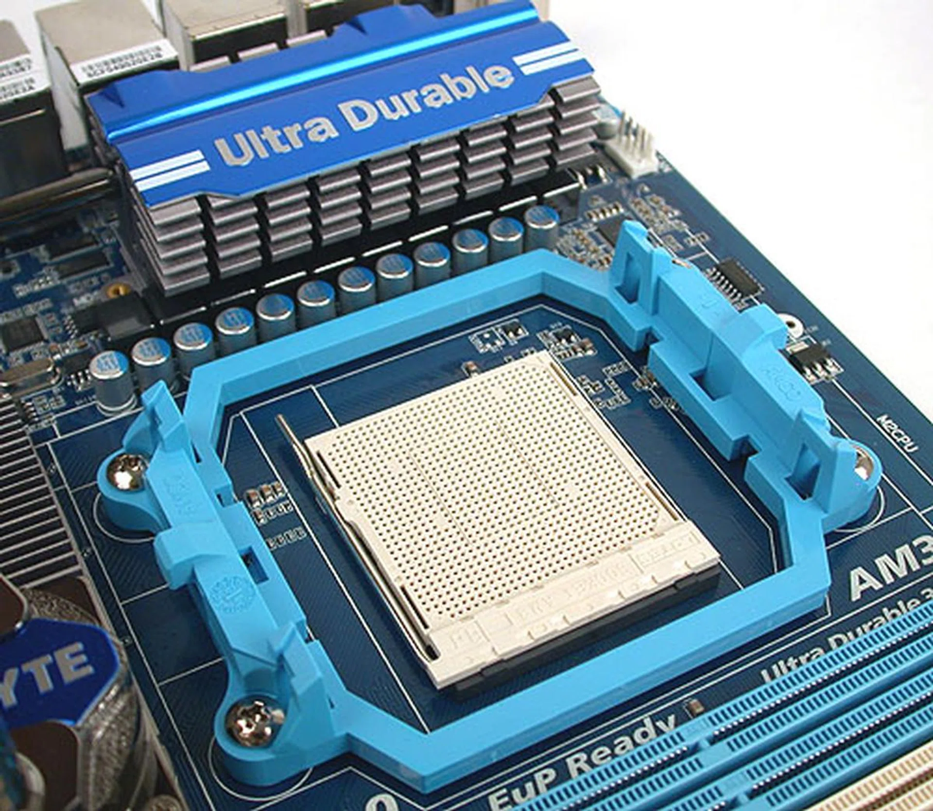 The usual MOSFETs and capacitors surround the CPU socket. Gigabyte doesn't appear to go too extreme when it comes to the board's power delivery design, at least not to the extent that we have seen previously in the UD7 tier.