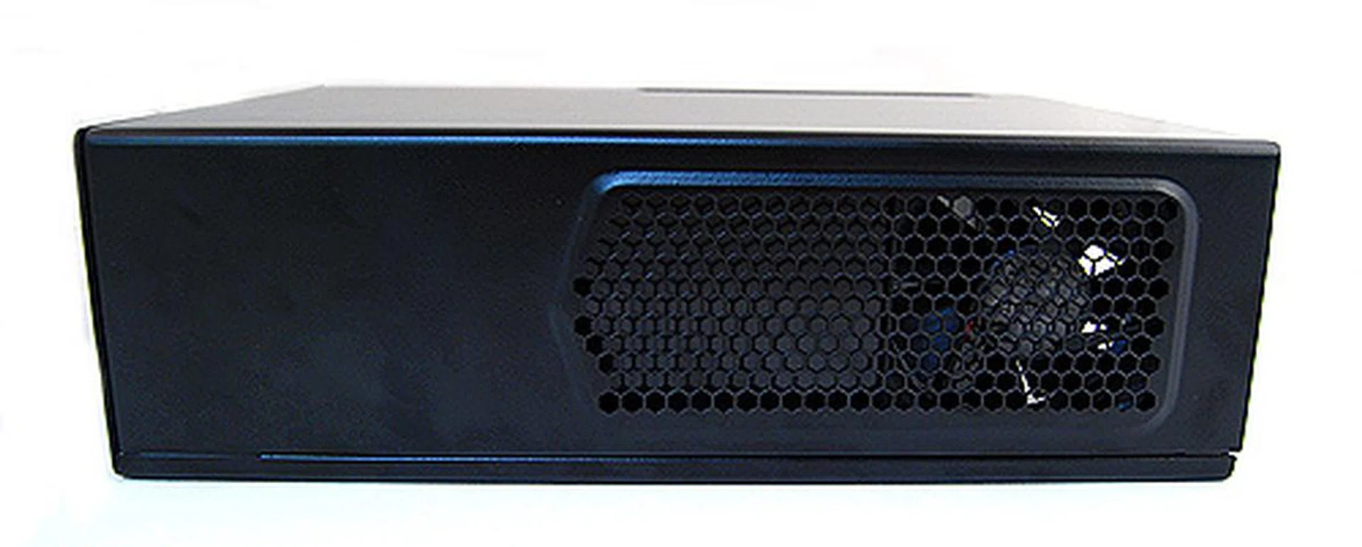 Moving to the side, we can see the ISK300-65's solitary fan. You can add an additional fan by removing the bracket next to it.