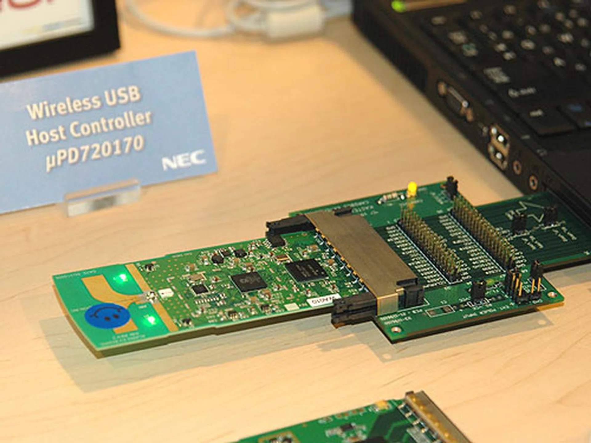 NEC showcased their wireless USB host controller which can be integrated into a PCMCIA card for notebooks.