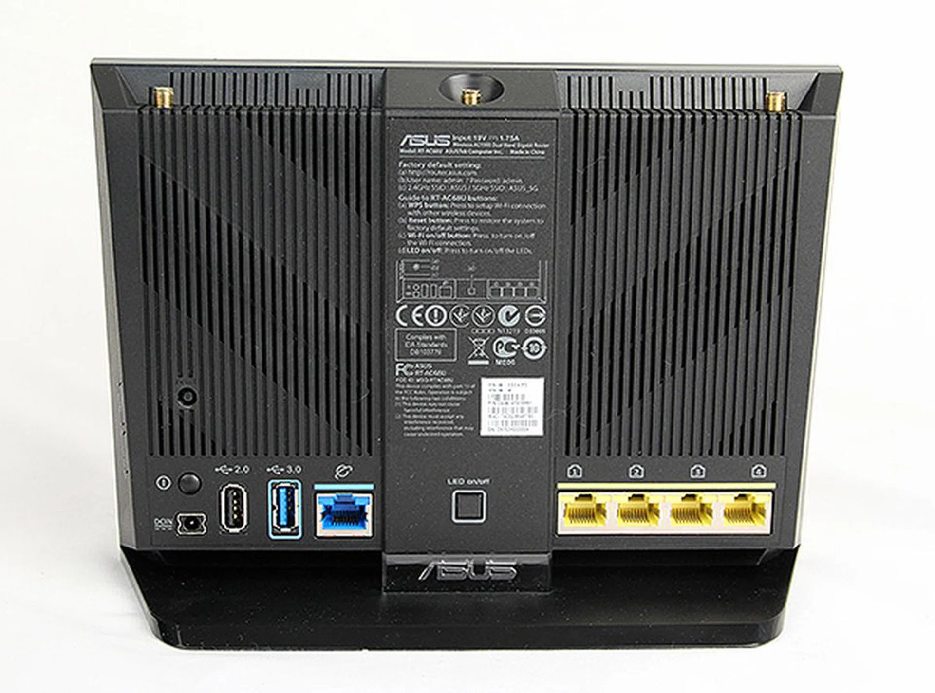 The rear is vented to let heat escape and the RT-AC68U offers two USB ports (1 x USB 3.0, 1 x USB 2.0), a WAN port and LAN ports. There is also a button to turn the front-facing LED indicators off.