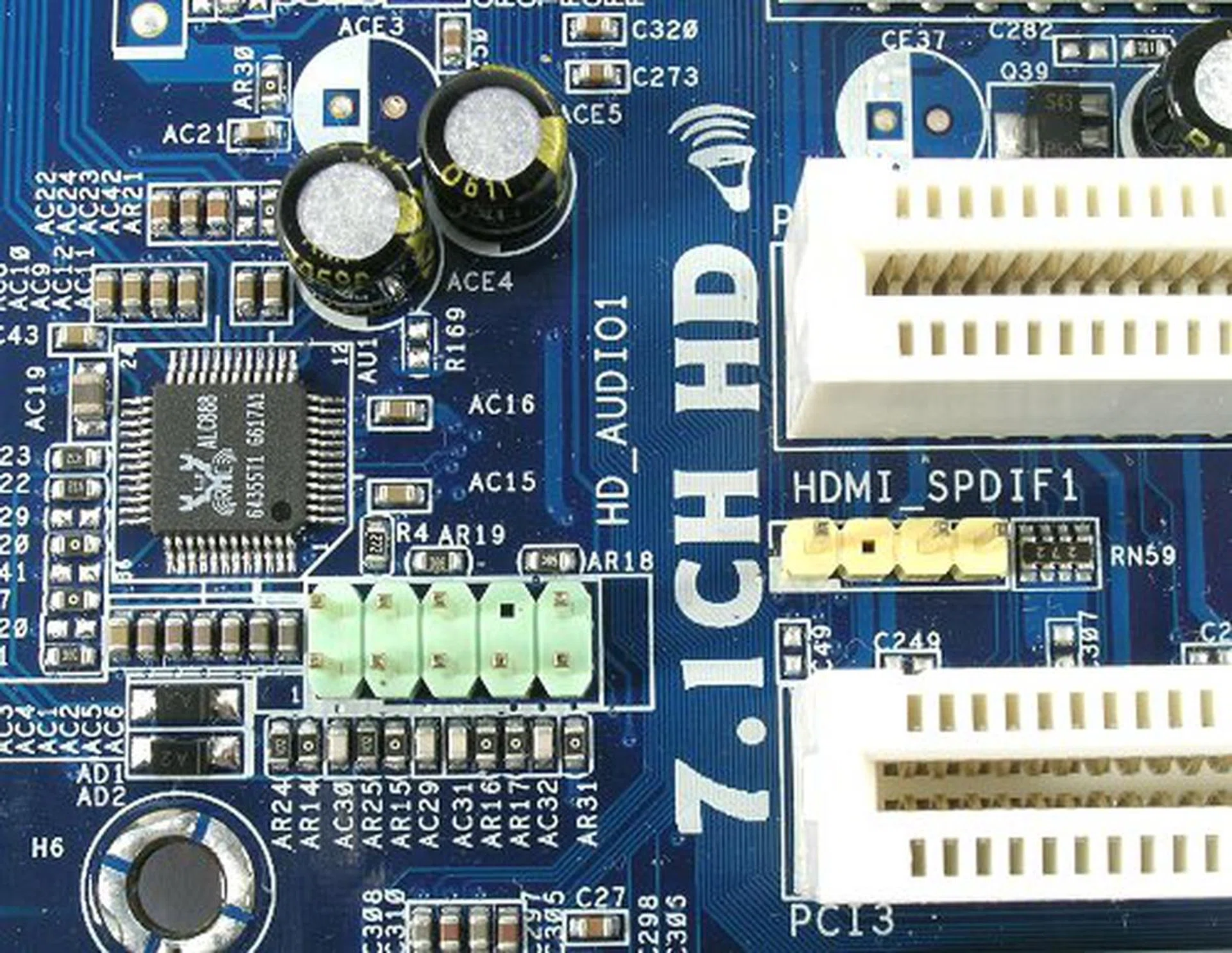 Realtek's new ALC888 CODEC with green HD Audio front panel header. The yellow header to the right is a dedicated HDMI S/PDIF connection to HDMI capable graphics cards. ASRock bundles the appropriate cables with the board too.