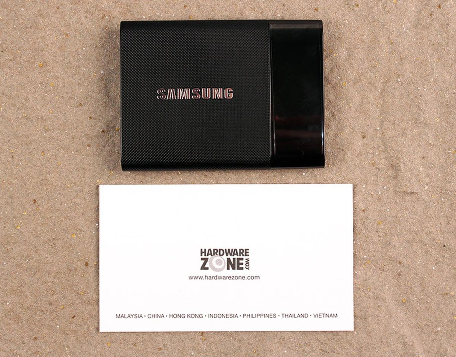 The Samsung Portable SSD T1 is incredibly small. Here it is next to a name card. 
