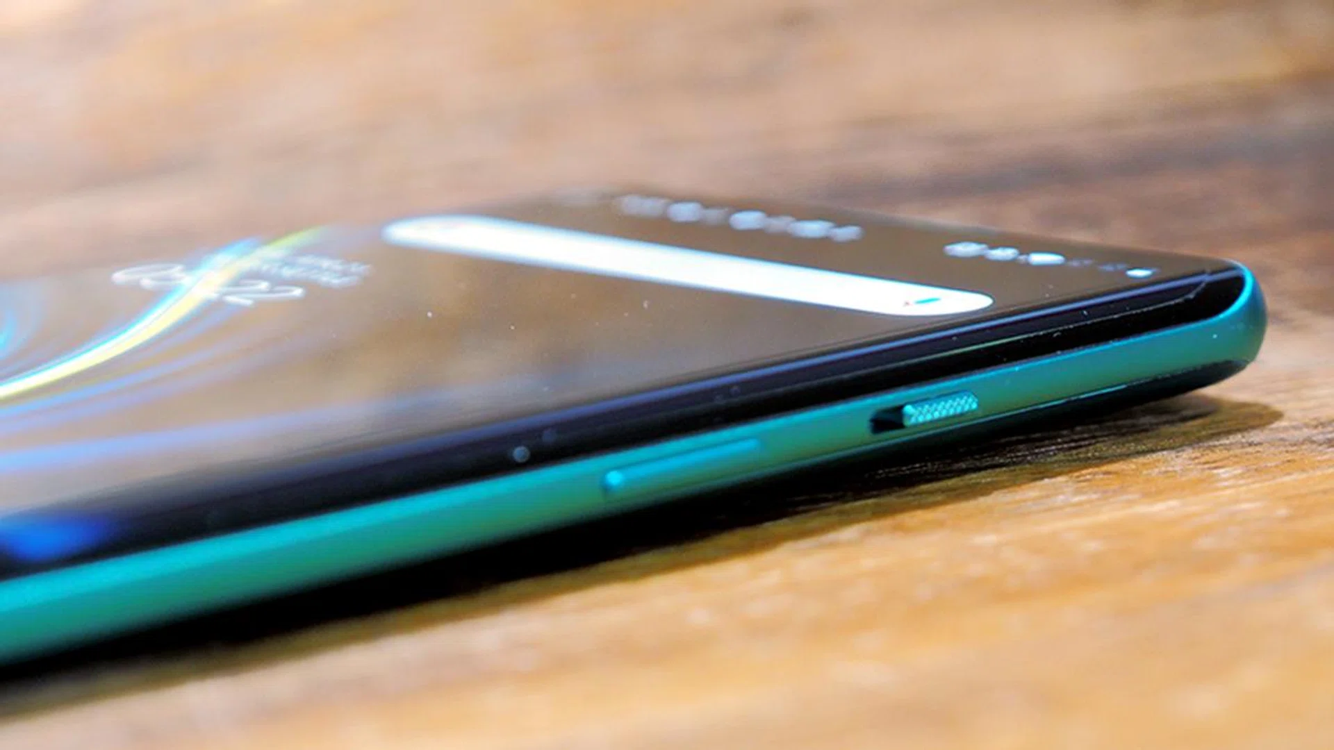 The grooved slider is a silence toggle that switches between full sound, vibrate only, and DND (no sound nor vibration).