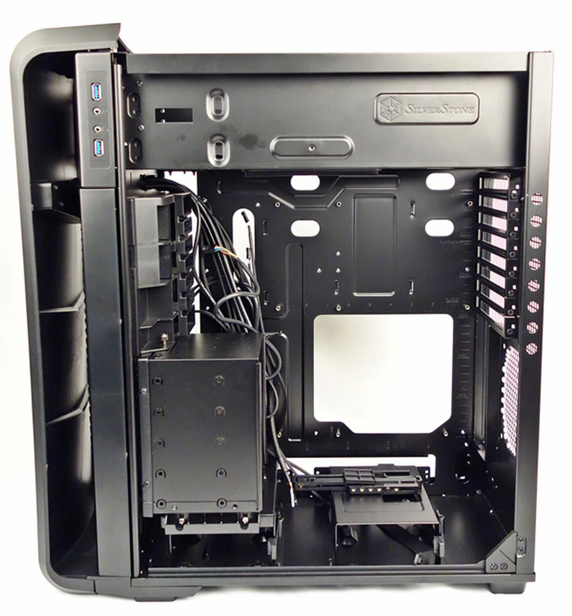 With the side panels removed, we can see the removable 3.5-inch drive enclosure that is located right behind one of the front intake cooling fans.