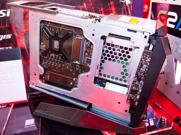 The opposite panel will let you access the other micro-DIMM memory slot and the NVMe M.2 SSD slot. The system comes preinstalled with one micro-DIMM and NVMe M.2 SSD which are installed on the main side of the motherboard (accessible only when you remove the graphics card). 