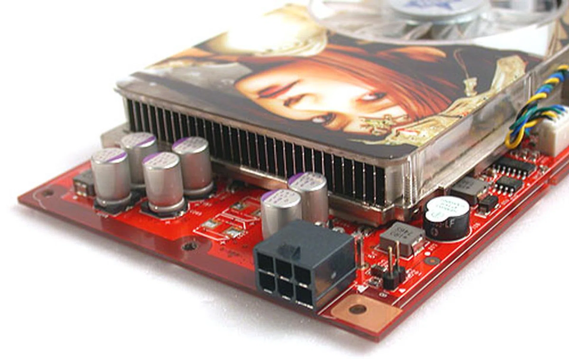 Without the shroud that's found on the usual GeForce 8800 GT, the power connector and the solid capacitors are clearly seen.