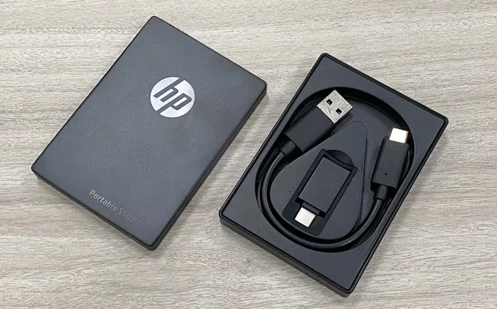 The case back snaps off to reveal the data cable.