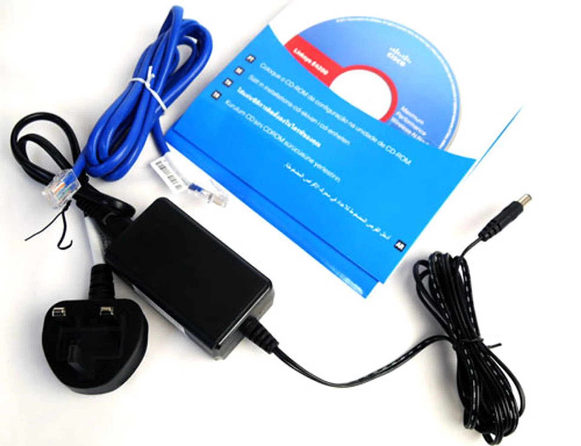 The E4200 is bundled with a 12V power adapter, an Ethernet cable, and a CD containing the Cisco Connect software. The Ethernet cable is only about a meter long. Keep that in mind if you have no plans to mount the router anywhere near your modem.  