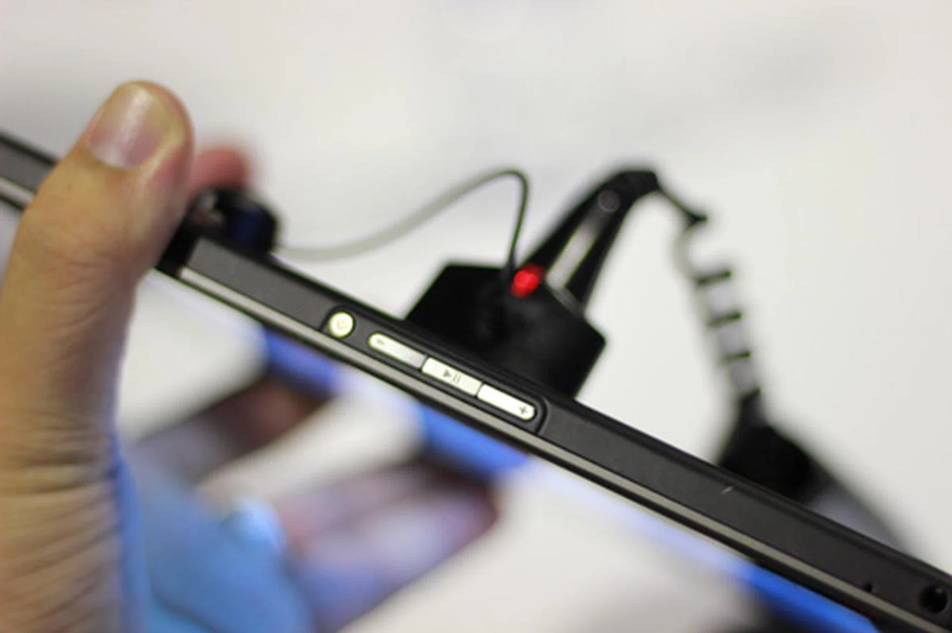 The media control buttons are placed up top, and are also recessed into the bezel.