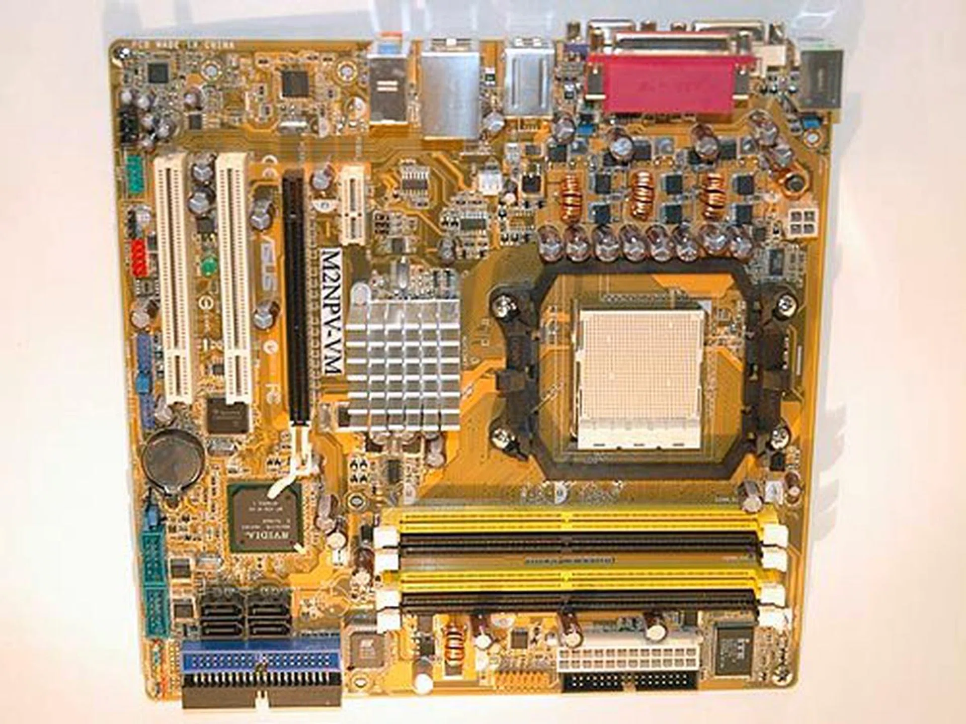 The M2NPV-VM is an integrated graphics solution for the new Socket M2 platform. Based on the NVIDIA GeForce 6150 chipset, the board offers integrated graphics with DVI-D and analog RGB output interfaces. It also comes with SATA 3G RAID, Gigabit Ethernet LAN and IEEE 1394a support.