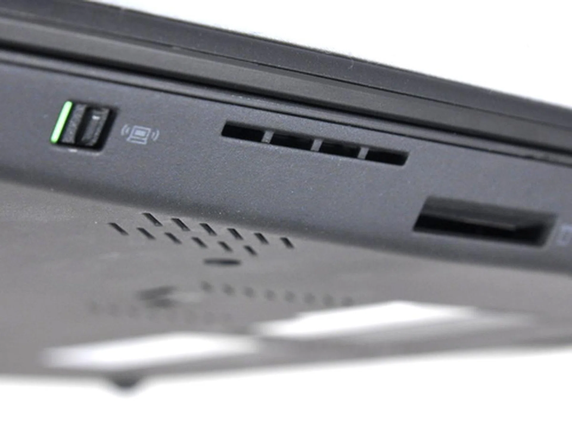 The right side of the notebook has an SD card reader slot that doesn’t have a protective flap, and a handy mechanical Wi-Fi switch.