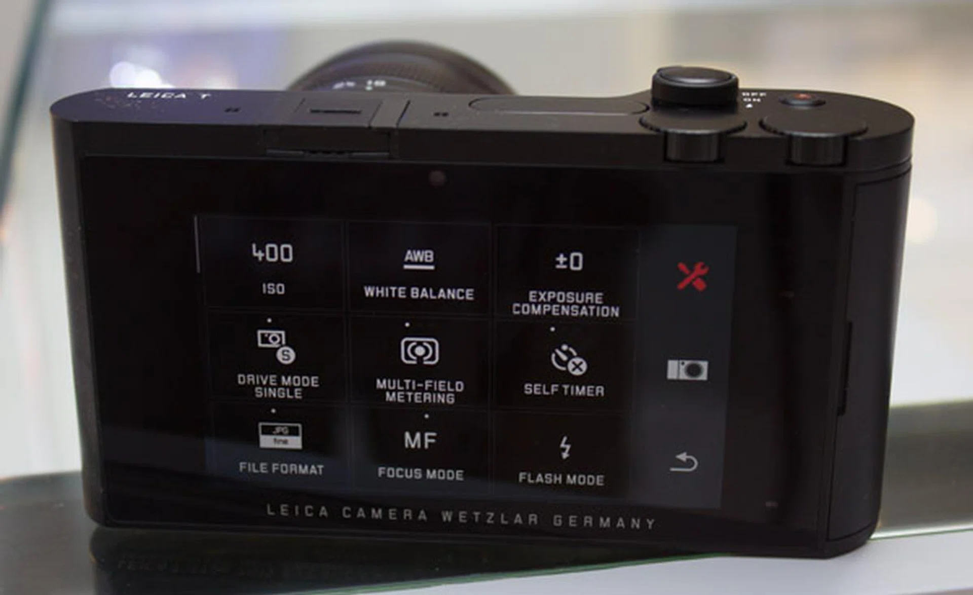 While the tools icon holds settings like drive mode, self-timer and white balance. 