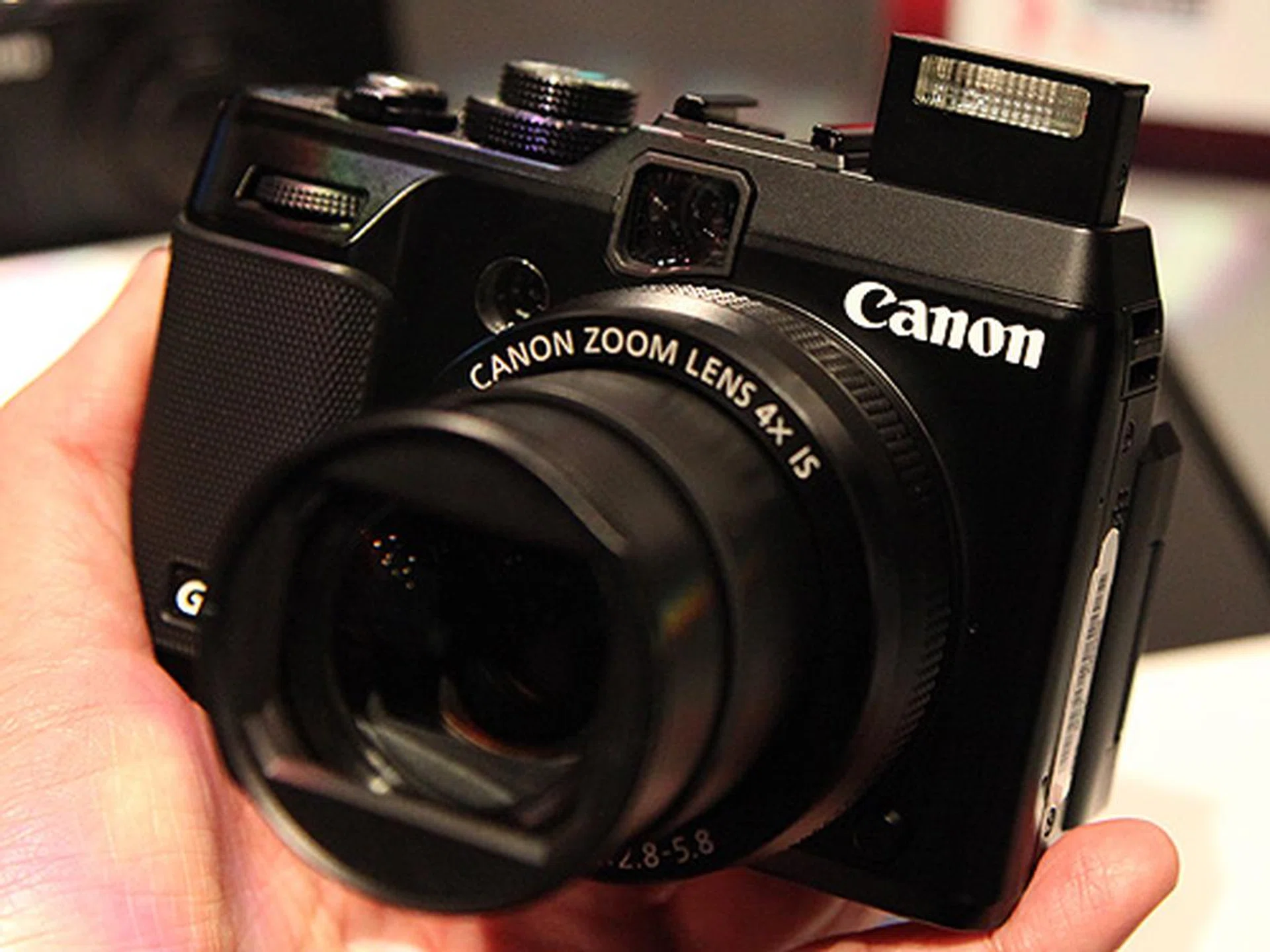 The built-in flash is no longer located in the front like the PowerShot G12. It is now hidden in the PowerShot G1 X and will pop-up when released. A hot shoe is provided for those who prefer to use a more powerful external flash unit.