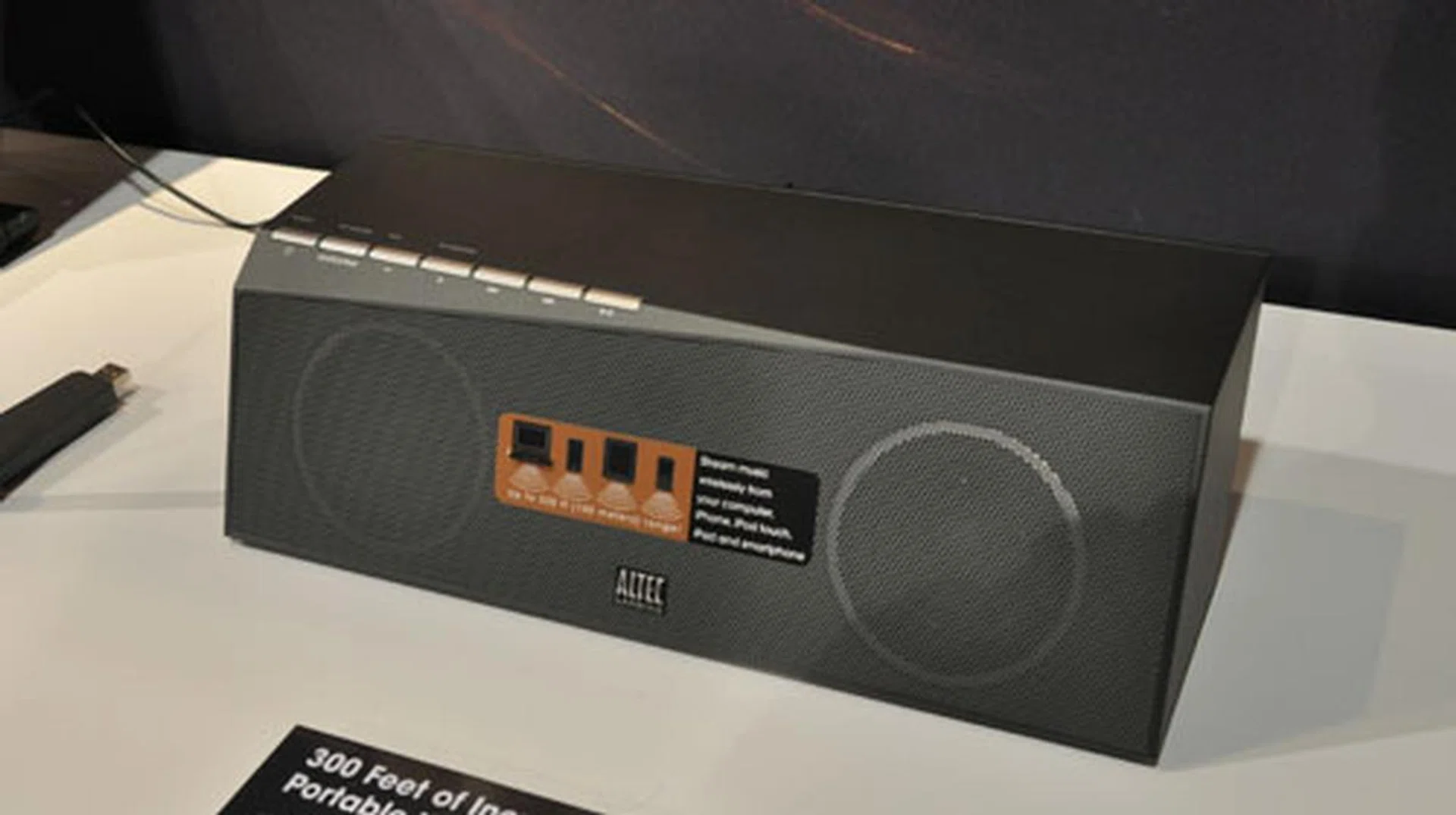 Altec Lansing's key device would be this inMotion Air, which allows you to playback your music from 300 feet (~91 meters). It also has a rechargeable battery for 7 hours of playback.