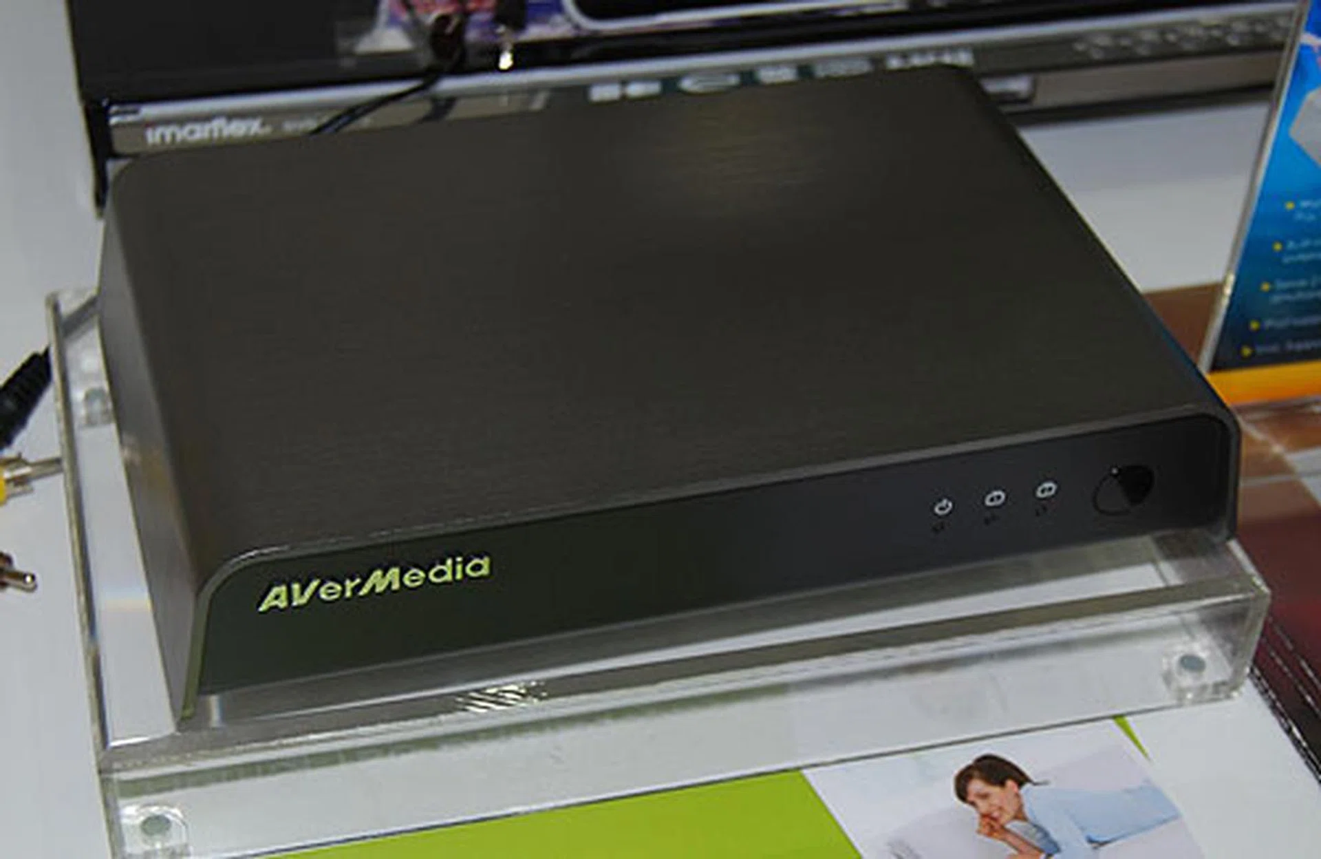 One of AVerMedia's newer products is the HomeFree Combo, which is a streaming device that enables up to two different users on two separate PC systems to watch TV programs without being in front of their TV. You'll have to connect this device to your set top box and a wireless router for it to work. 