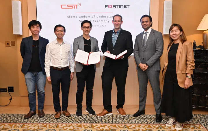 Darren Teo, Chief Executive, CSIT, Ng Chad-Son, Deputy Secretary (Technology), MINDEF, Tan Yi Zhao, Deputy Chief Executive, CSIT, Derek Manky, Global VP, Threat Intelligence, Fortinet, Vishak Raman, Vice President, India, S.E.A, HK and ANZ, Fortinet, and Joyce Loh, Sales Director, Government and Healthcare, Fortinet. Image source: Fortinet
